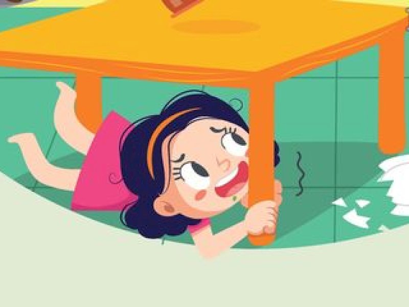 Untuk melindungi diri, salah satu tindakan yang harus dilakukan saat gempa terjadi yaitu merunduk di bawah meja. ( Youtube/Majalah Bobo)