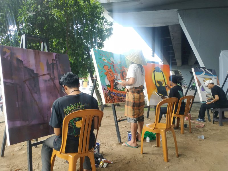 MARS Sulsel kerja sama MAIM aksi "Seni Melawan Korupsi" di flyover Jl Urip Sumoharjo-Pettarani, Makassar, Kamis (8/12/22). (Dok. Atry/jejakfakta.com)