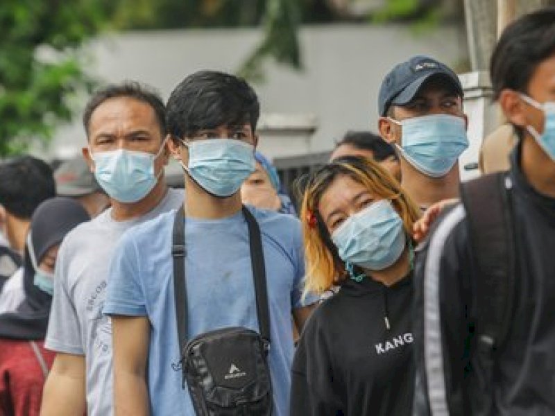 ilustrasi warga pakai masker. &copy;2021 Liputan6.com/Herman Zakharia