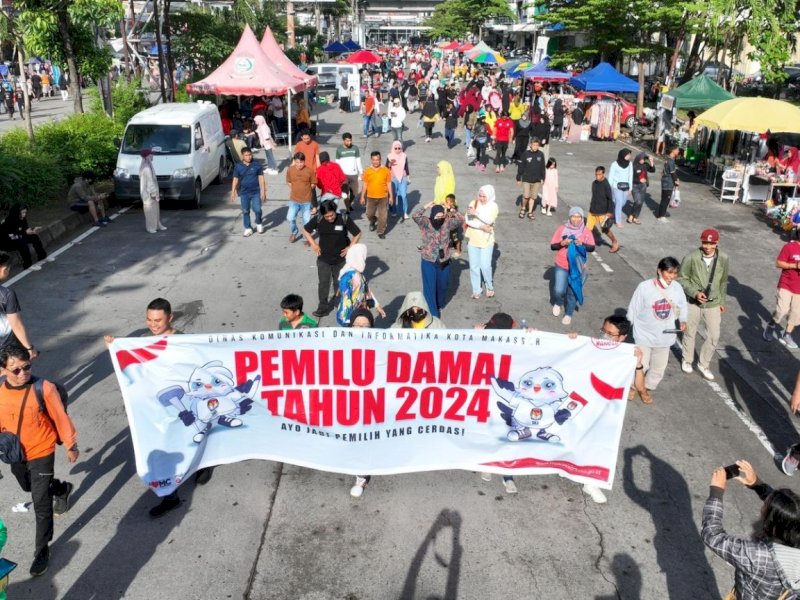 Dinas Komunikasi dan Informatika (Diskominfo) Kota Makassar sosialisasi Pemilu Damai di kawasan Car Free Day (CFD) Jalan Boulevard, Minggu (28/1/2024). @Jejakfakta/dok. Diskominfo Makassar