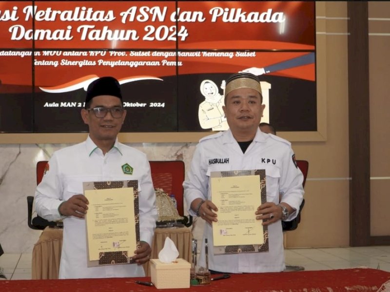 Kepala Kanwil Kementerian Agama Provinsi Sulawesi Selatan (Sulsel), Muh. Tonang meneken Perjanjian Kerja Sama (PKS) dengan Komisi Pemilihan Umum (KPU) Sulsel terkait sinergitas pelaksanaan tugas dan fungsi penyelenggaraan pemilu, di Aula MAN 2 Kota Makassar, Senin (7/10/2024). @Jejakfakta/dok. Humas Kemenag Sulsel