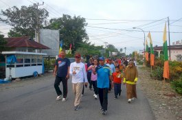 Ratusan Warga Meriahkan Sabtu Sehat, Camat Tomoni Timur Ingatkan Bahaya Rabies