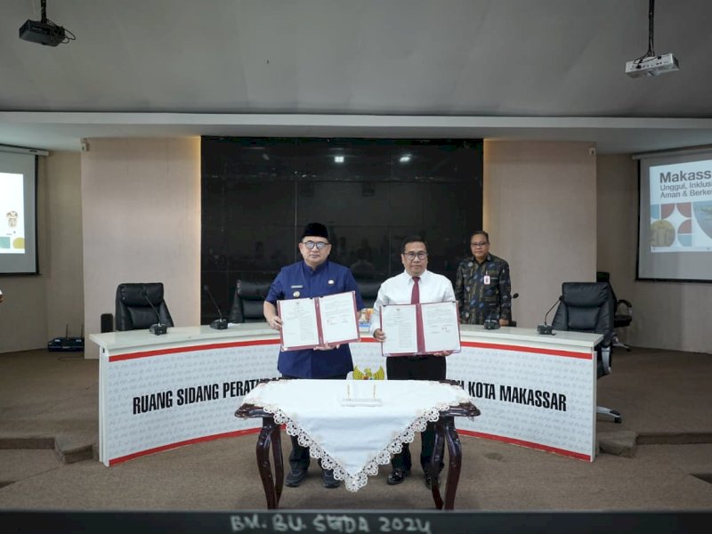 Penandatanganan nota kesepahaman (MoU) antara Pemkot Makassar dan Kejaksaan Negeri Makassar terkait penanganan perkara perdata dan tata usaha negara di Ruang Sipakalebbi, Balai Kota Makassar, Jumat (13/3/2026). @Jejakfakta/dok. Humas Pemkot Makassar