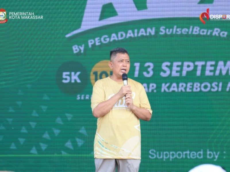 Kepala Dinas Pemuda dan Olahraga (Dispora) Kota Makassar Syamsul Bahri, mewakili Wali Kota Makassar melepas peserta Gold Run by Pegadaian Sulselbar di Makassar, Minggu (13/9/2026). @Jejakfakta/dok. Humas Dispora Makassar